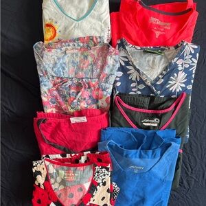 Bundle of 8 various used scrub tops size extra small and small
